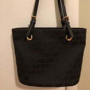 Black Michael Kors purse.